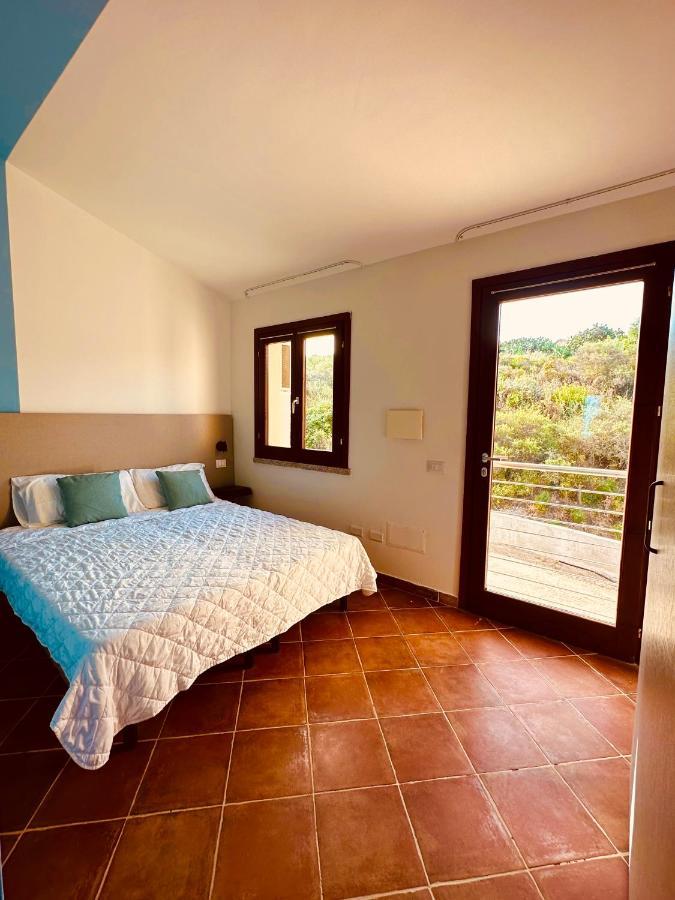 Rocce Rosse Sardinia Aparthotel อิโซลา โรสซา ภายนอก รูปภาพ