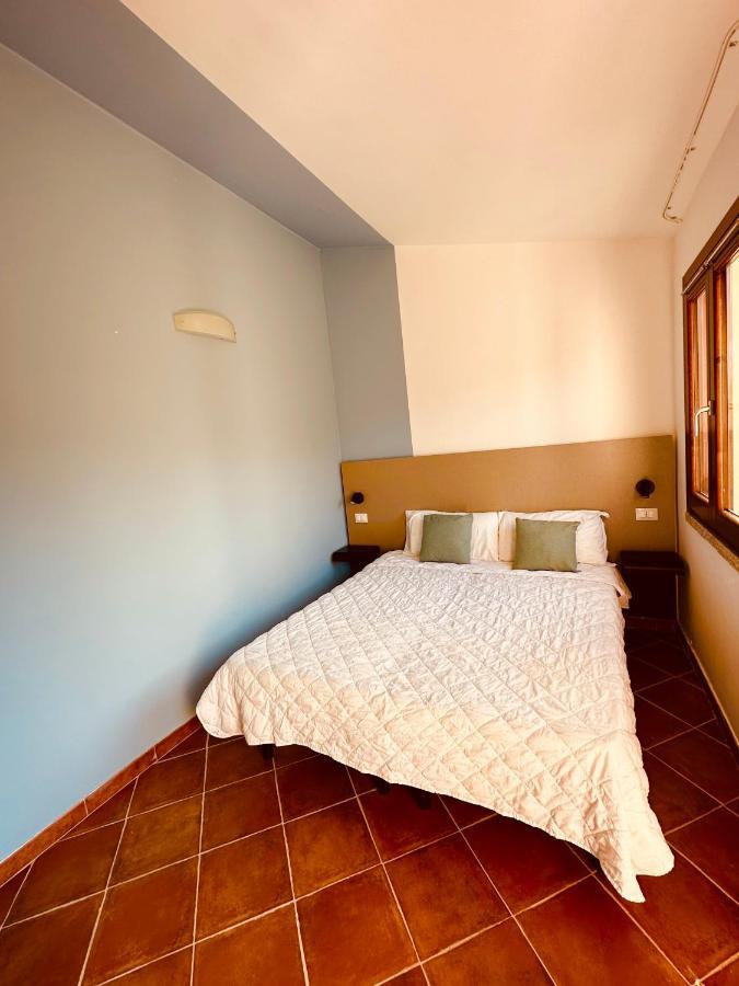 Rocce Rosse Sardinia Aparthotel อิโซลา โรสซา ภายนอก รูปภาพ
