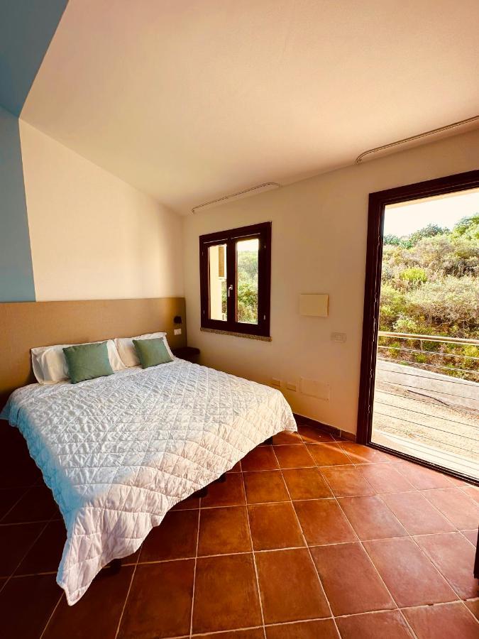 Rocce Rosse Sardinia Aparthotel อิโซลา โรสซา ภายนอก รูปภาพ