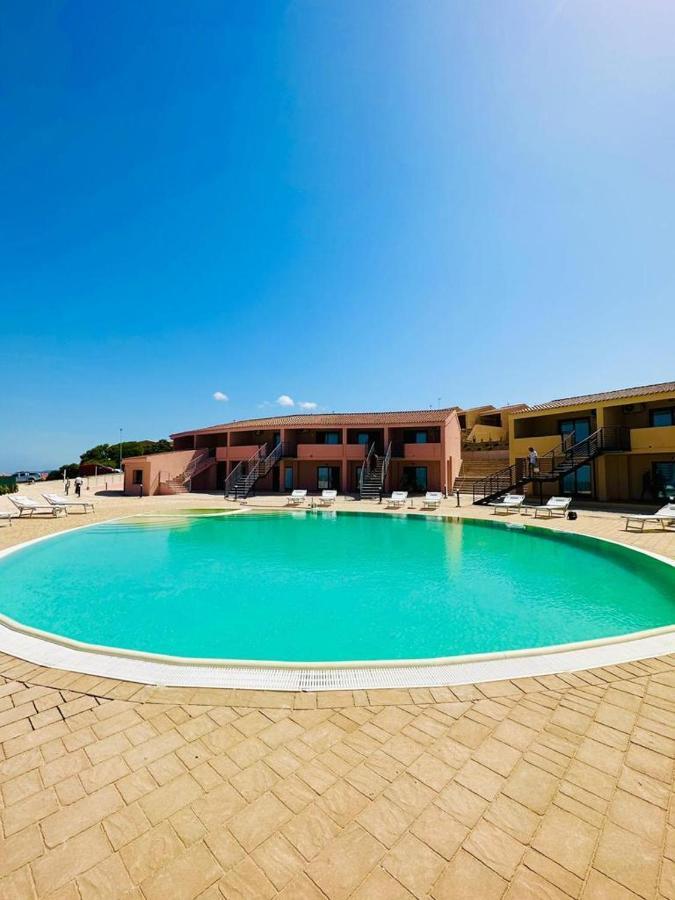 Rocce Rosse Sardinia Aparthotel อิโซลา โรสซา ภายนอก รูปภาพ