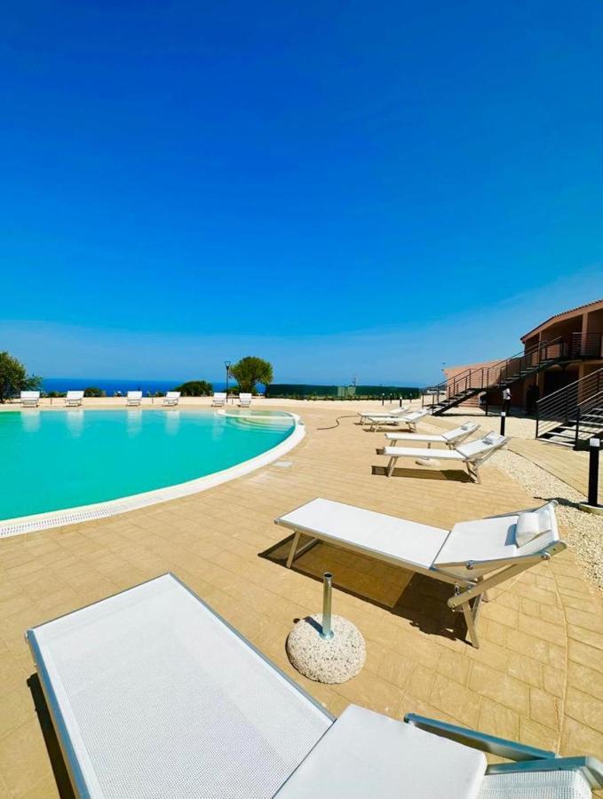 Rocce Rosse Sardinia Aparthotel อิโซลา โรสซา ภายนอก รูปภาพ